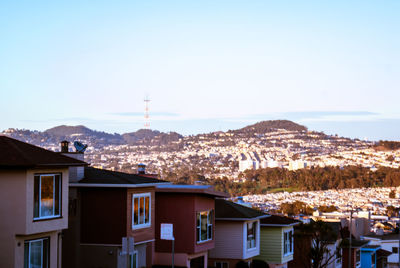 View of buildings in town against sky