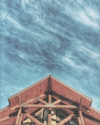 Low angle view of abandoned building against sky