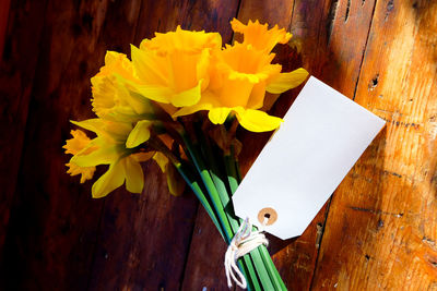 Close-up of yellow flower on table