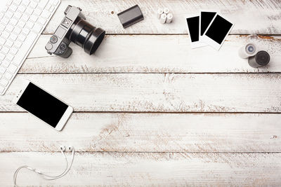 High angle view of smart phone on table