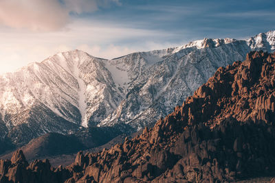 Scenic view of snowcapped mountains against sky