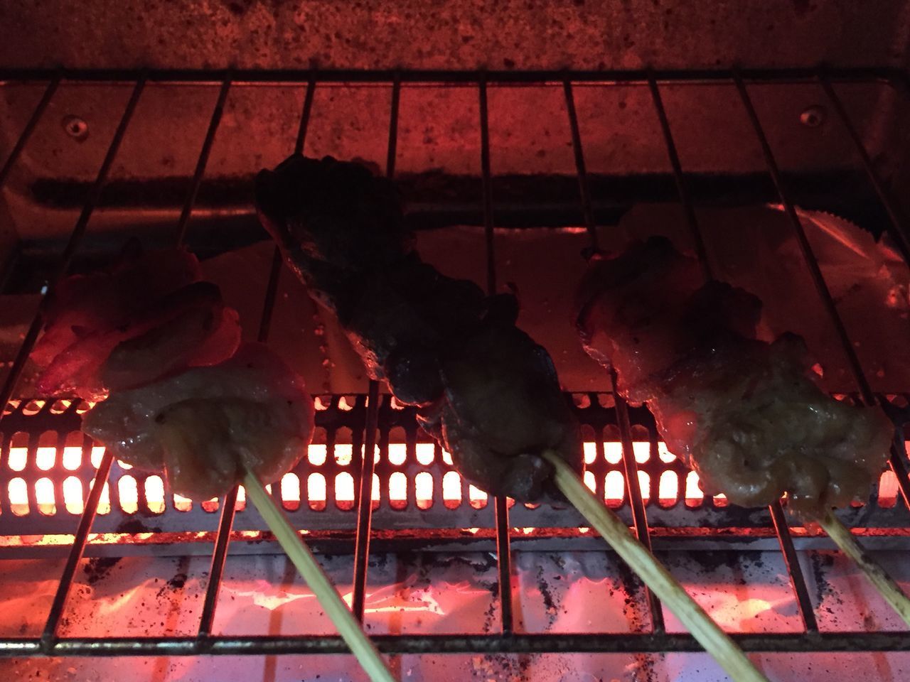 HIGH ANGLE VIEW OF MEAT ON BARBECUE