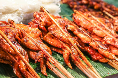 High angle view of meat on barbecue grill