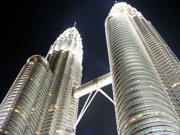 Low angle view of ferris wheel against sky