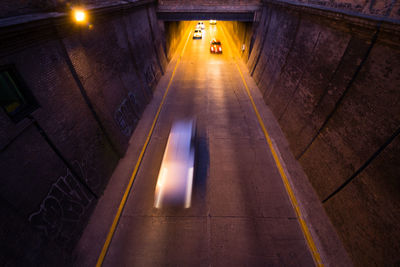 High angle view of illuminated road in tunnel