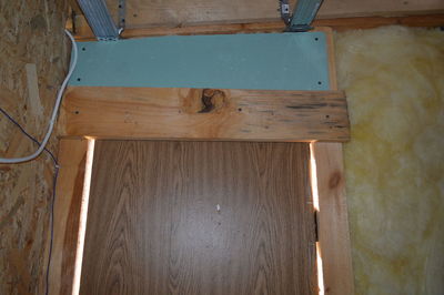 Low angle view of wooden table in abandoned room