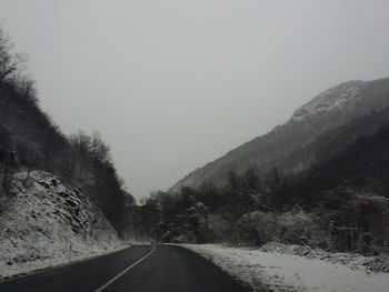 Road passing through country road