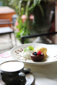 Close-up of cake served on table