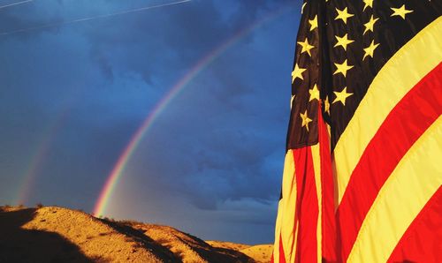 Low angle view of rainbow against sky