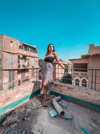 Fashion model posing in a rooftop