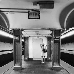 Man standing in corridor