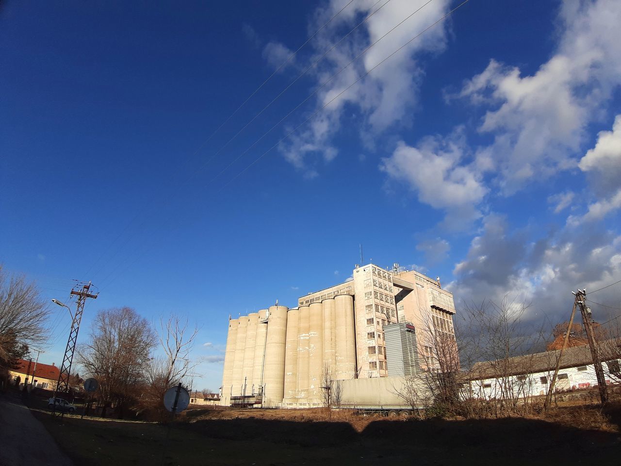 BUILDING AGAINST BLUE SKY