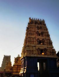 Low angle view of statue of building against sky