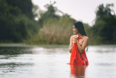 Woman looking at lake