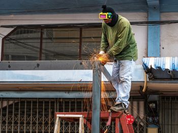 Man working on metal structure