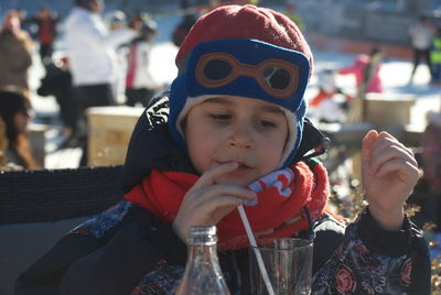 Portrait of cute boy drinking ice cream