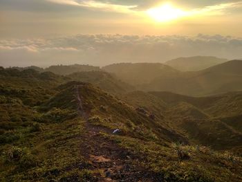 Scenic view of landscape against sky during sunset