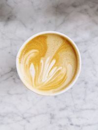 High angle view of cappuccino on table