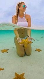 Woman swimming in sea