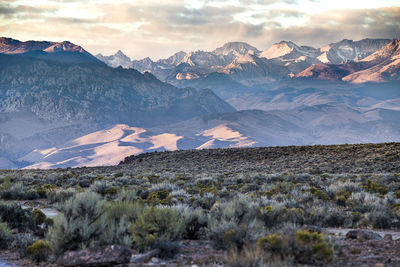 Scenic view of landscape against sky during sunset