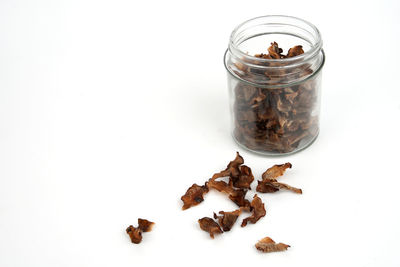 High angle view of drink in glass jar on white background
