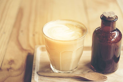 Close-up of cappuccino served in tray