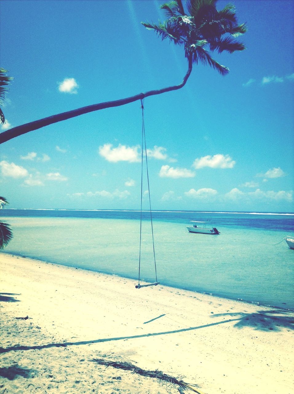 sea, horizon over water, water, beach, sky, tranquil scene, tranquility, shore, scenics, beauty in nature, nature, blue, sand, idyllic, cloud - sky, cloud, nautical vessel, outdoors, no people, calm