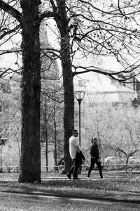 Father and daughter walking at park