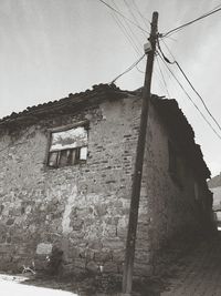 Low angle view of old building against clear sky