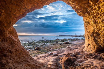 Scenic view of sea against cloudy sky