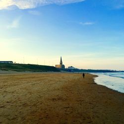 View of beach against sky during sunset