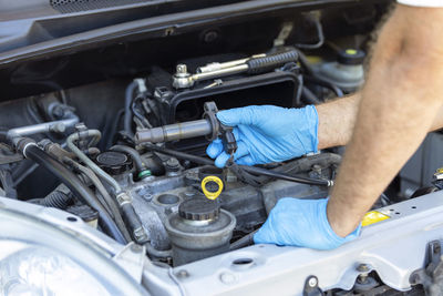 Ignition coil change or replacement. repairing of vehicle engine.