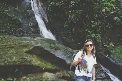 Portrait of young woman in forest