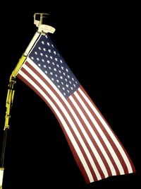 Low angle view of flag against the sky