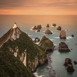 Scenic view of sea at sunset