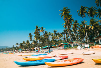 Scenic view of beach against clear blue sky