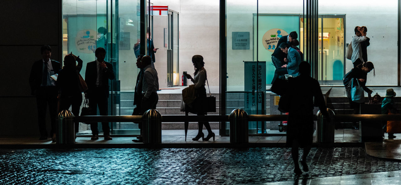 GROUP OF PEOPLE WAITING FOR SALE