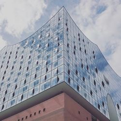 Low angle view of modern building against sky