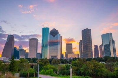 Skyscrapers in city against sky