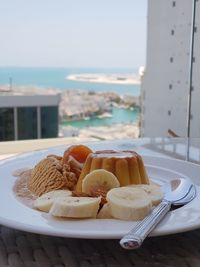 Close-up of breakfast in plate on table