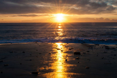 Scenic view of sunset over sea