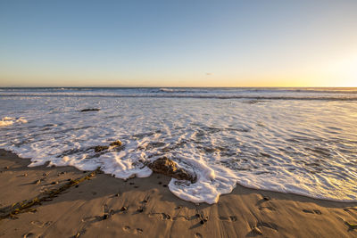 Scenic view of sea against clear sky