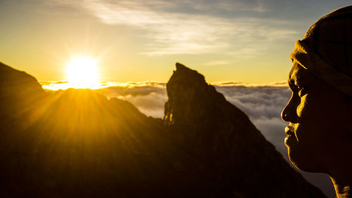 Scenic view of mountains at sunset