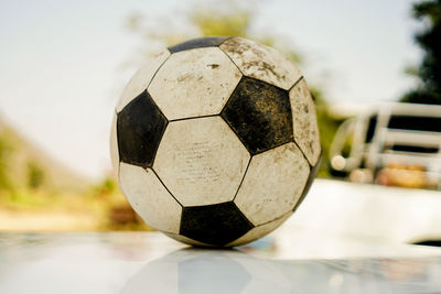 Close-up of soccer ball against white background