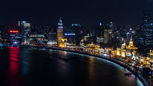 Illuminated city lit up at night