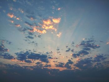 Low angle view of cloudy sky during sunset