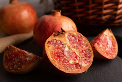 Close-up of fruits in basket on table