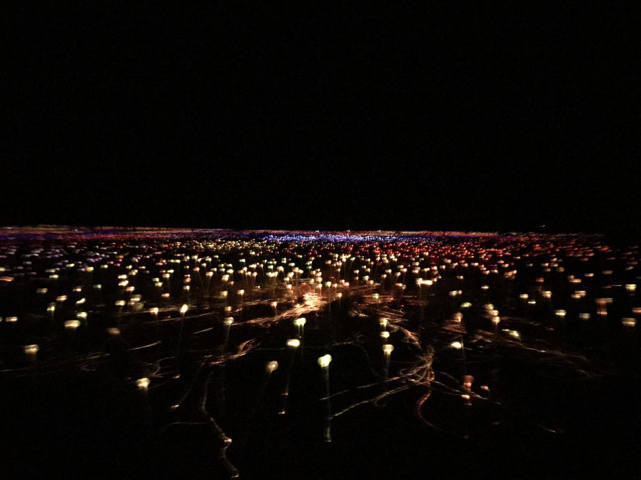 ILLUMINATED CITY AT NIGHT