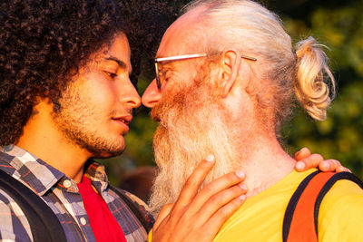 Side view of senior man smoking