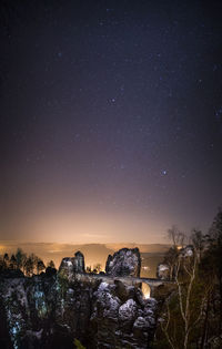 Scenic view of star field against sky at night